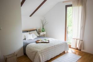 Krevet ili kreveti u jedinici u objektu Green Hills Cottage in Zagorje with magnificent view