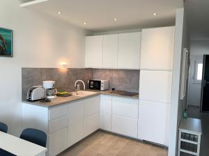 Kuchyňa alebo kuchynka v ubytovaní Apartman Polje