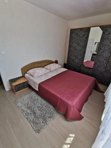 Postel nebo postele na pokoji v ubytování Apartment Nera