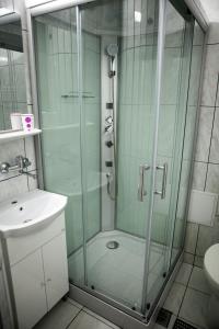 Ett badrum på Hotel Allegro