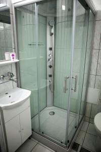 Koupelna v ubytování Hotel Allegro