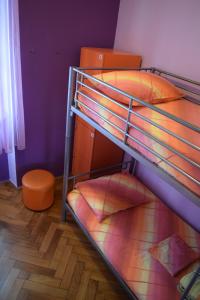 a bedroom with a bed and a desk at Old Town Hostel Split in Split
