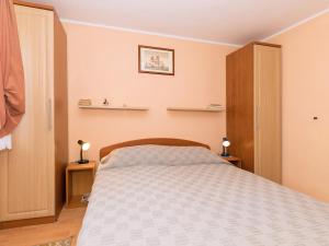 Postel nebo postele na pokoji v ubytování Apartments Davorka