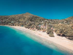 an aerial view of a resort on a beach at Bequia Beach Hotel - Luxury Resort in Friendship