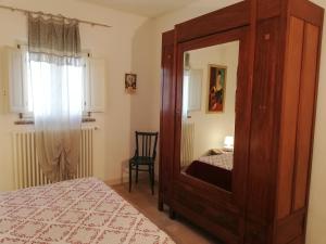 Posteľ alebo postele v izbe v ubytovaní B&B Giovannarolla Green House