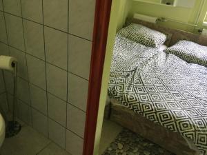 Postel nebo postele na pokoji v ubytování Balatongyöngye vendégház