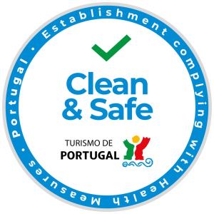 a blue clean and safe logo at CASA d’OLIVENÇA in Elvas