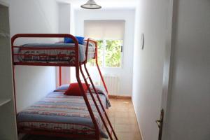 Ένα ή περισσότερα κρεβάτια σε δωμάτιο στο Apartamentos el Cardenillo