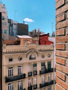 a building with balconies on the side of a building at Ayuntamiento Silence in Valencia