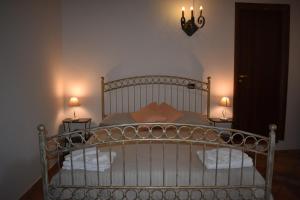 Letto o letti in una camera di Residenza L'Antico Borgo Hotel