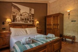 Posteľ alebo postele v izbe v ubytovaní Casanova - Panoramic Rooms and Suites + 37 fotografií
