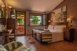 En eller flere senge i et værelse på Casanova - Panoramic Rooms and Suites