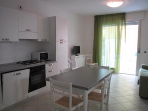 Kuchyň nebo kuchyňský kout v ubytování Residence Gianka - Agenzia Cocal