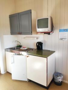 Kuchyň nebo kuchyňský kout v ubytování Målselvfossen Feriesenter