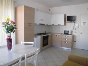 Kuchyň nebo kuchyňský kout v ubytování Residence Gianka - Agenzia Cocal