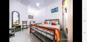 Letto o letti in una camera di Charlton Kandy City Rest