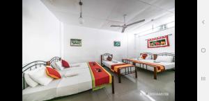 Letto o letti in una camera di Charlton Kandy City Rest