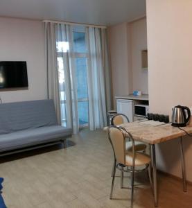 TV a/nebo společenská místnost v ubytování Apart Hotel Smart Studio