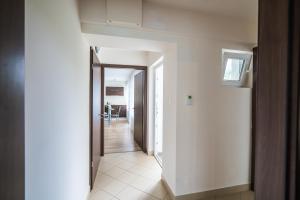 Posteľ alebo postele v izbe v ubytovaní Siesta Sziget - Balaton-parti Apartmanok