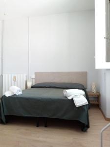 Postel nebo postele na pokoji v ubytování BINARIO 5
