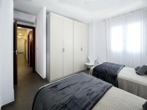Postel nebo postele na pokoji v ubytování Casa Luz by Ĥ