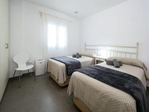 Postel nebo postele na pokoji v ubytování Casa Luz by Ĥ