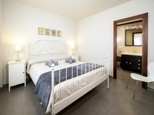 Postel nebo postele na pokoji v ubytování Casa Luz by Ĥ