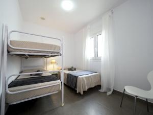 Postel nebo postele na pokoji v ubytování Casa Luz by Ĥ