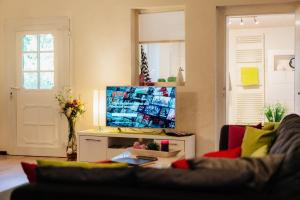 TV a/nebo společenská místnost v ubytování Ferienwohnung Einbeck FeWo B Nolte