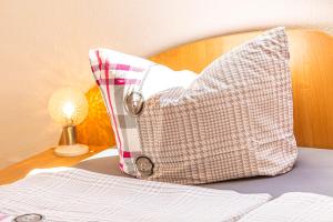 Postel nebo postele na pokoji v ubytování Ferienwohnung Am Walnussbaum