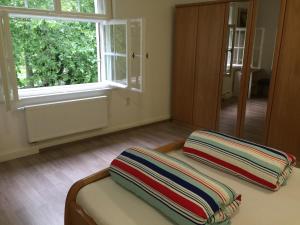 Postel nebo postele na pokoji v ubytování Gästezimmer Hozici