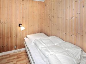 Postel nebo postele na pokoji v ubytování 7 person holiday home in Hemmet-By Traum