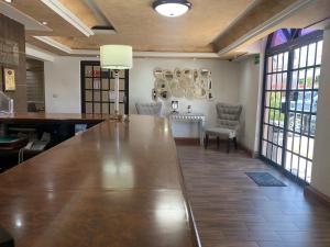 Posezení v ubytování Casagrande Hotel