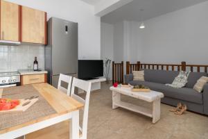 Un televizor și/sau centru de divertisment la Deluxe Sunrise