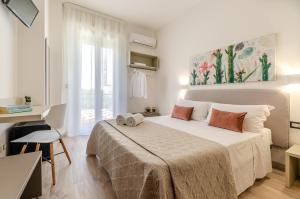 Postel nebo postele na pokoji v ubytování Nonna Germina Locazione Turistica