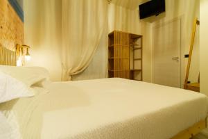 Postel nebo postele na pokoji v ubytování B&B 49 passi
