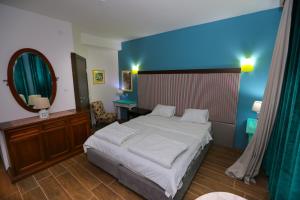 Postel nebo postele na pokoji v ubytování Hotel Konak Tammy Platičevo - Šabac