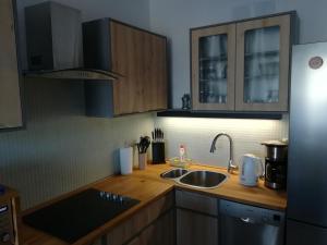 Kuchyňa alebo kuchynka v ubytovaní Apartament Oaza Kołobrzeg-Podczele Kompleks Feniks basen siłownia jacuzii