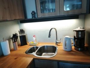 Kuchyňa alebo kuchynka v ubytovaní Apartament Oaza Kołobrzeg-Podczele Kompleks Feniks basen siłownia jacuzii