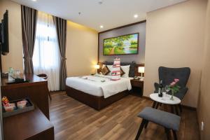 Ένα ή περισσότερα κρεβάτια σε δωμάτιο στο Nagila Boutique Hotel