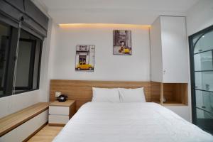 Voodi või voodid majutusasutuse L'amie Hotel & Studio toas