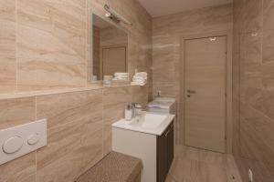 Kúpeľňa v ubytovaní Apartments Villa Hadria
