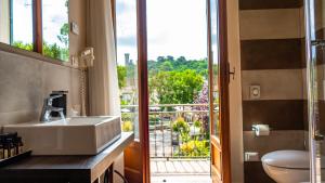 Koupelna v ubytování Relais Villa Borghetto
