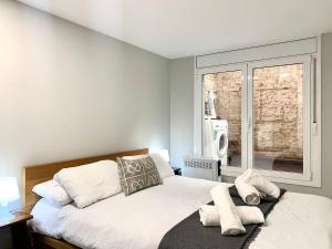 Posteľ alebo postele v izbe v ubytovaní Dalí Residence