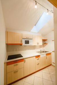 Kuchyň nebo kuchyňský kout v ubytování Sonnhof Appartements