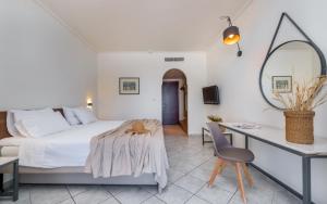 Voodi või voodid majutusasutuse Phoenix Beach Hotel toas