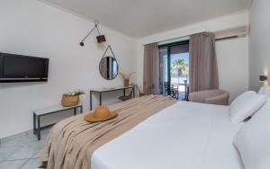 Voodi või voodid majutusasutuse Phoenix Beach Hotel toas