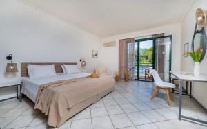 Voodi või voodid majutusasutuse Phoenix Beach Hotel toas