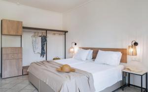 Voodi või voodid majutusasutuse Phoenix Beach Hotel toas