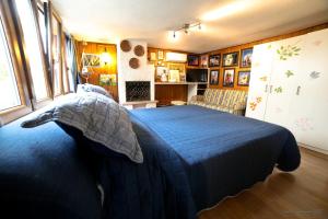 Ένα ή περισσότερα κρεβάτια σε δωμάτιο στο Vacanze a Viareggio